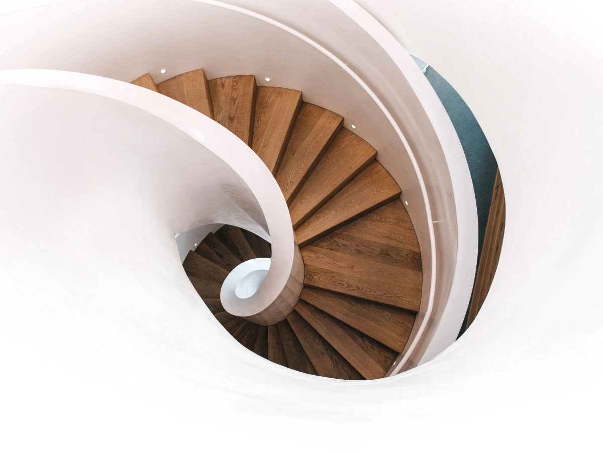 Brown spiral stairwell seen from above