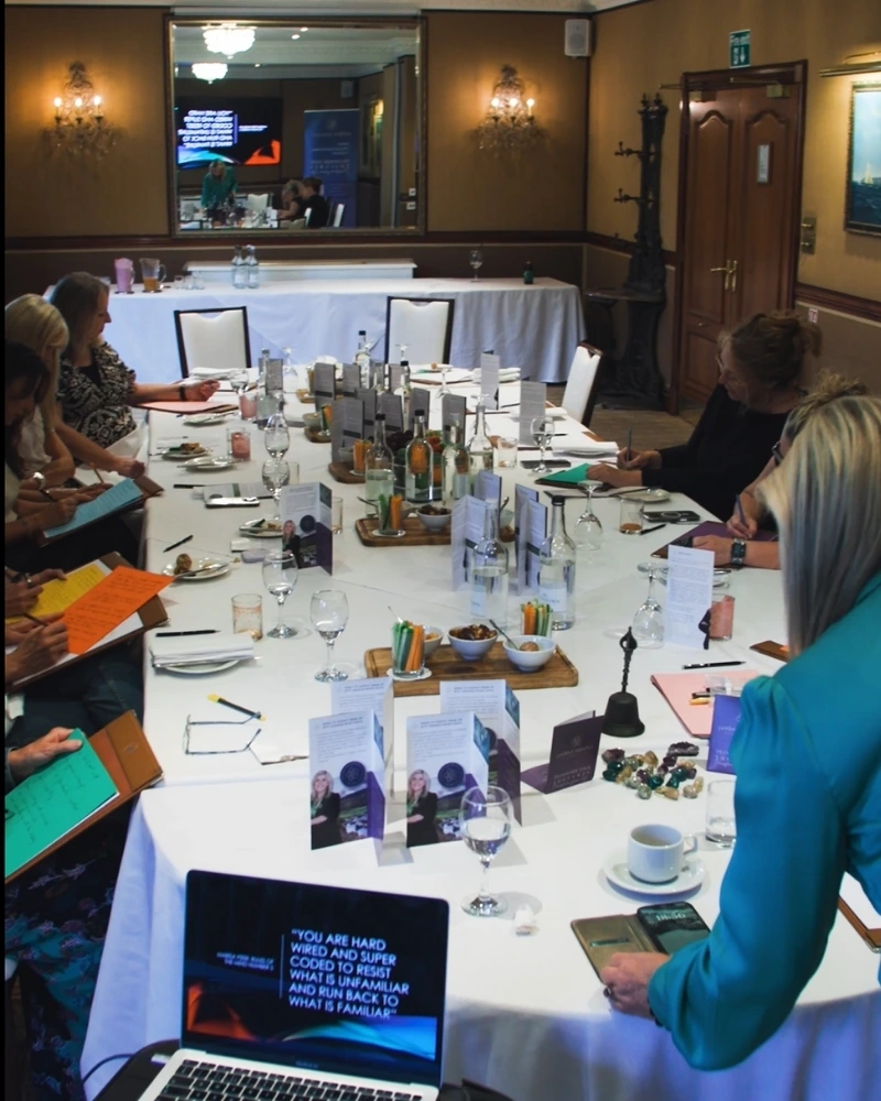 A boardroom table with workshop materials prepared for a RTT Workshop