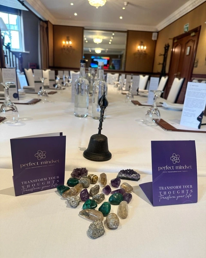 A boardroom table with workshop materials prepared for a RTT Workshop